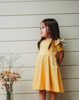 MUSTARD TWIRLY GIRL DRESS - Toots Kids
