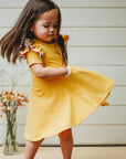 MUSTARD TWIRLY GIRL DRESS - Toots Kids